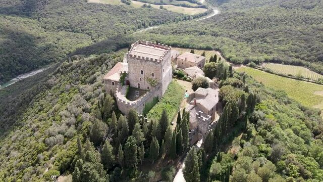 Ripa Orcia Castle, Orcia Valley, Tuscany. Circular aerial view at sunset