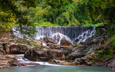 Waterfall in the beautiful deep forest of Thailand.