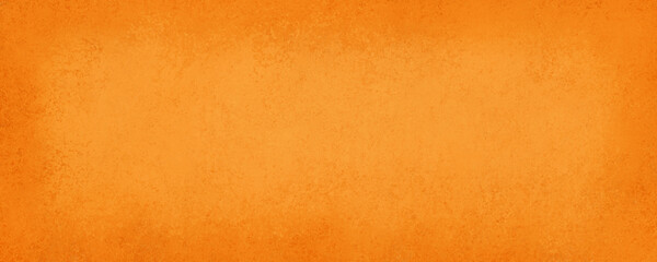 Orange background for halloween or fall with old vintage texture grunge borders, hot vibrant orange color paper, autumn or thanksgiving background colors