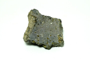 Macro shooting a piece of basalt natural rock isolated on white background. 