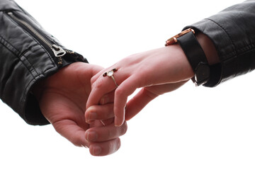 close-up of the hands of a couple on white background