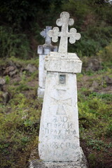 Old crosses and monuments in the cemetery.
Unknown graves