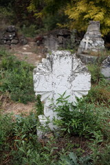 Old crosses and monuments in the cemetery.
Unknown graves