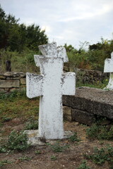 Old crosses and monuments in the cemetery.
Unknown graves