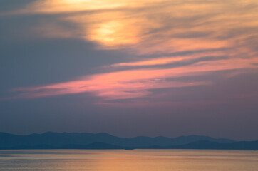Naklejka na ściany i meble Sonnenuntergang an der Mittelmeerküste in Kroatien
