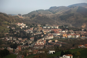 Fototapeta na wymiar Look at Oiartzun village surronded by mountains at the Basque Country.