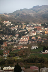 Fototapeta na wymiar Look at Oiartzun village surronded by mountains at the Basque Country.