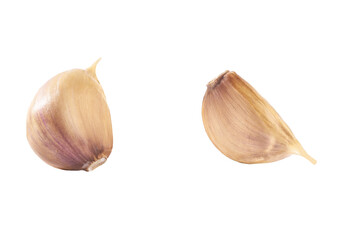 unpeeled cloves garlic isolated on white background.