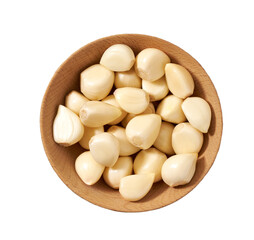 Fototapeta na wymiar peeled garlic cloves in a wooden bowl isolated on white background, top view.