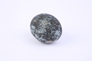 Gray marble painted Easter egg on white background