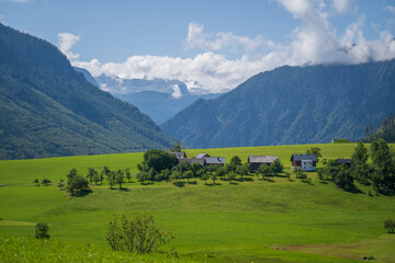 View of the village, fields and forest in mountains Alps Austria