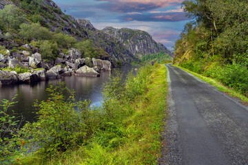Fototapeta na wymiar Thrilling rides and breathtaking views along the bbackroads of southern Norway, near Kristiansand
