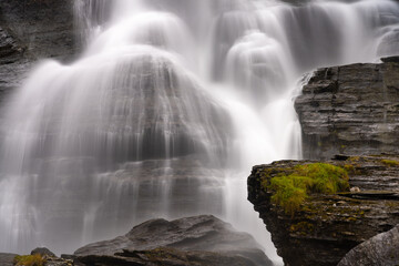 Steinsdalsfossen (also Øvsthusfossen or Øfsthusfossen) a waterfall in the village of Steine in...