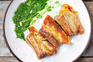 ribs fried grill pork or beef B-B-Q fat food spices spicy fresh meal snack on the table copy space food background rustic 