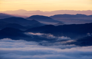 Fototapeta na wymiar Sunrise over the mountains of Navarra from San Miguel de Aralar.