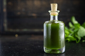 green oil parsley, dill, basil fresh mint meal snack on the table copy space food background rustic 