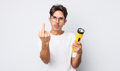young hispanic man feeling angry, annoyed, rebellious and aggressive. lantern concept