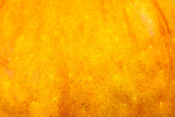 Close up photo of red apple background. Apples fruit peel texture, macro view. Beautiful natural wallpaper.