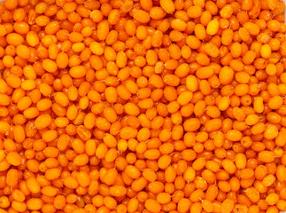 Sea buckthorn. Frozen berry. Culinary Background of ripe berries. A source of vitamins. The basis...