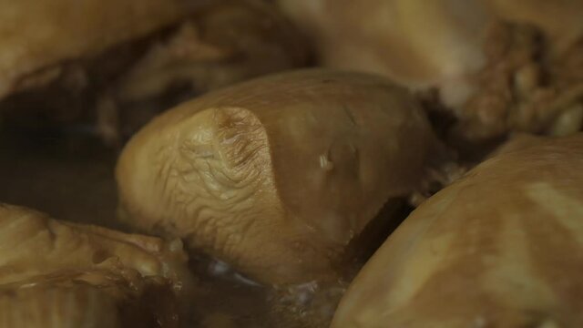 Chicken adobo browned in a pan