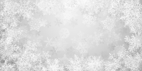Christmas background of big complex snowflakes in gray colors