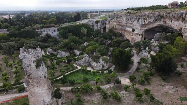 Impressive aerial view of the Latomie near the Greek theater of Syracuse, in Sicily Italy, taken on summer 2021
