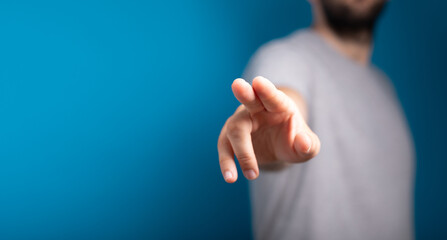 Businessman pointing or touching finger in screen..