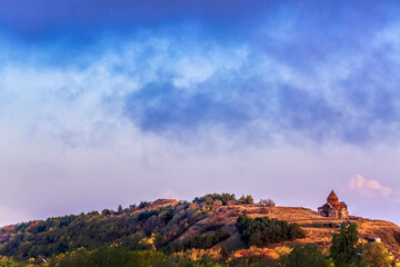 Ancient Sevanavank monastery on Lake Sevan in Armenia during sunset