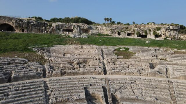 Stunning Panoramic view of old Greek theatre ruins in Syracuse, Sicily, italy.