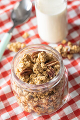 Sweet granola cereals in jar.