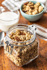 Sweet granola cereals in jar.