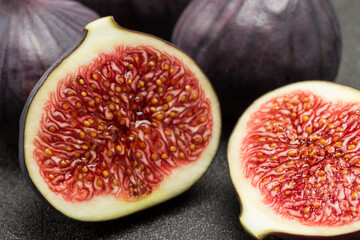 Two halves of fig. Ripe fruit pulp