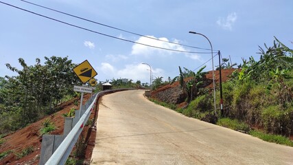 Photo of the downhill and uphill road leading to the tourist area in Cicalengka, Indonesia