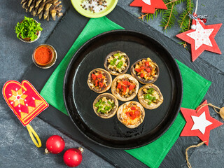 stuffed mushrooms with Christmas decoration around