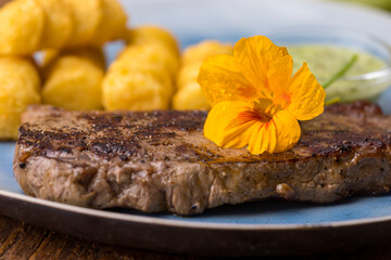 nasturtium on a steak