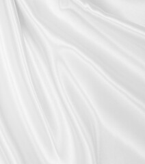 Obraz premium Smooth elegant white silk or satin luxury cloth texture as wedding background. Luxurious background design