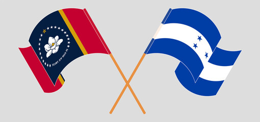 Crossed and waving flags of The State of Mississippi and Honduras