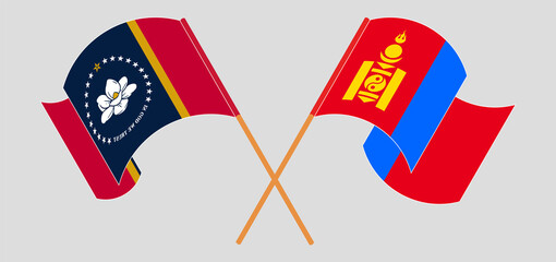 Crossed and waving flags of The State of Mississippi and Mongolia