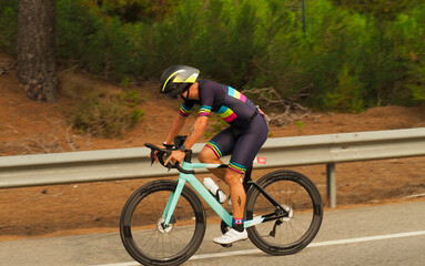 YOUNG TRIATHLETE RIDEING A BIKE