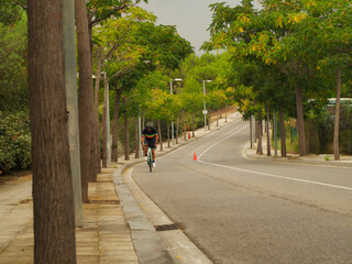 YOUNG TRIATHLETE RIDEING A BIKE