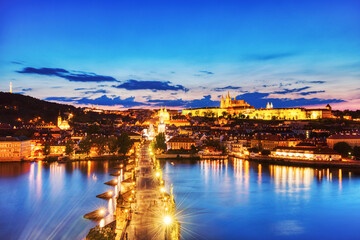 Aerial View of Illuminated Charles Bridge at Dusk, Prague