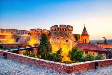 Illuminated Kalemegdan Fortress at Dusk, Belgrade - obrazy, fototapety, plakaty
