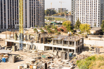 Construction site with cranes, residential complex