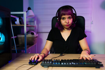 Beautiful young woman gaming