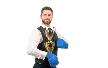 boss show victory and authority. businessman in boxing gloves with trophy.
