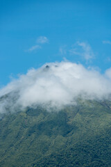 vertical as of the arenal volcano with clouds