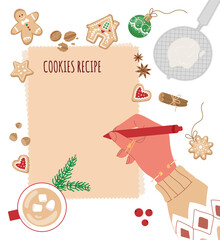 Hand in sweater with a pen write on a blank cooking page. Preparing for baking.Top view.