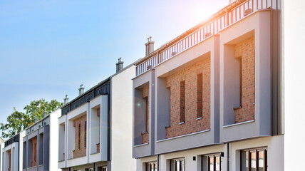 Modern single family terraced homes. Newly built homes in a residential estate.
