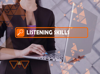  LISTENING SKILLS text in search bar. Modern Banker looking for something at laptop. LISTENING SKILLS concept.