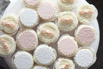 Beautiful cupcakes or muffins on a white tray